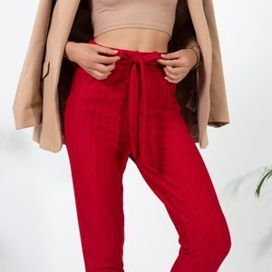 Червоні жіночі штани з блискучою ниткою