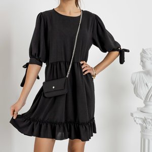 Чорна жіноча сукня з сумочкою