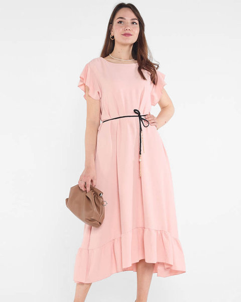 Світло-рожева жіноча сукня з оборками