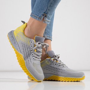 Жіноче спортивне взуття сірого та жовтого кольору - Взуття